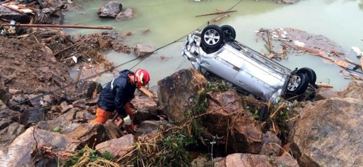 Rescuers pull 15 out from China landslide caused by Typhoon Megi, 32 missing