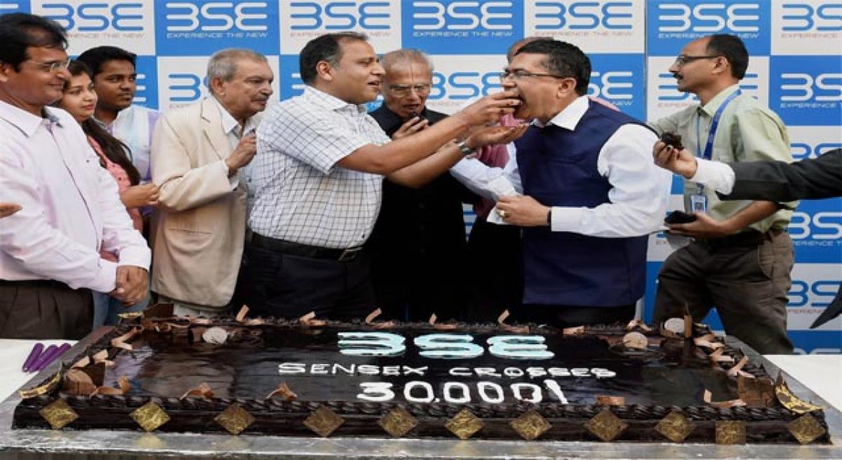 Sensex scales 30k on global cues