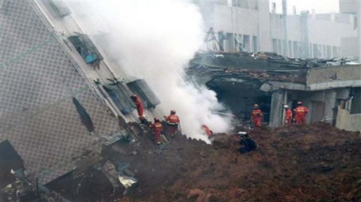 91 missing from landslide that buries buildings in China