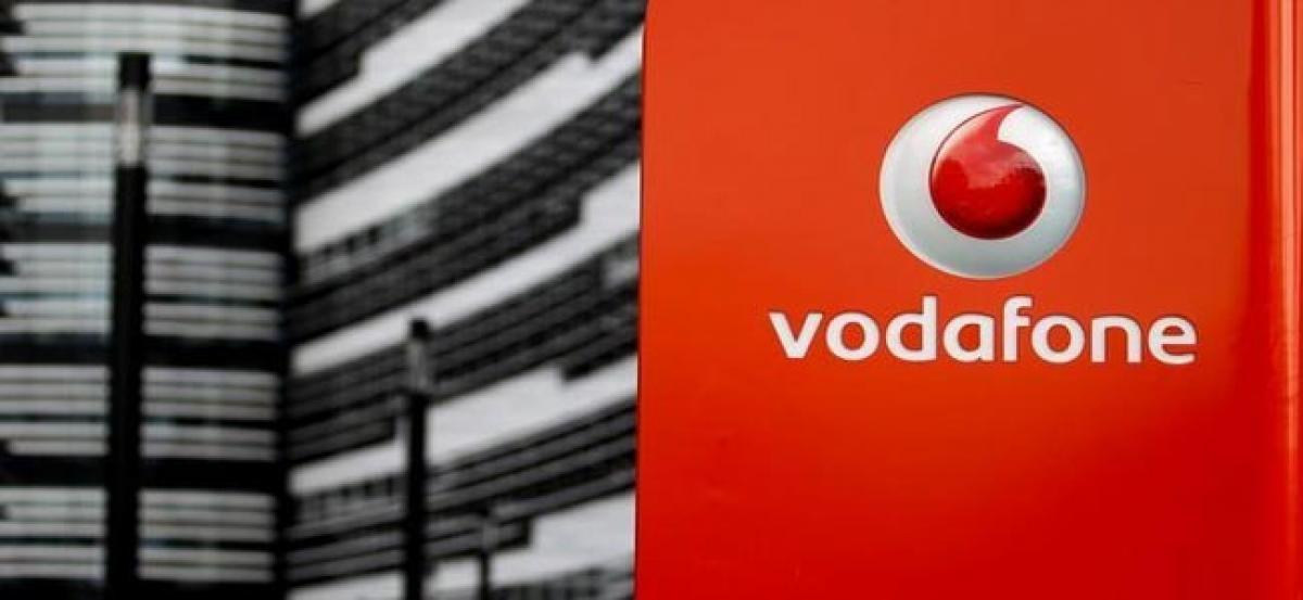 Vodafone says pressures in India and UK to weigh on earnings