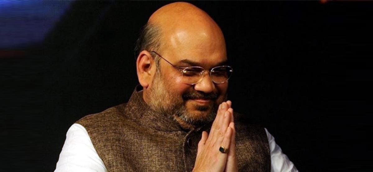 Congress making an issue out of nothing, Manmohan visited more countries than Modi: Amit Shah