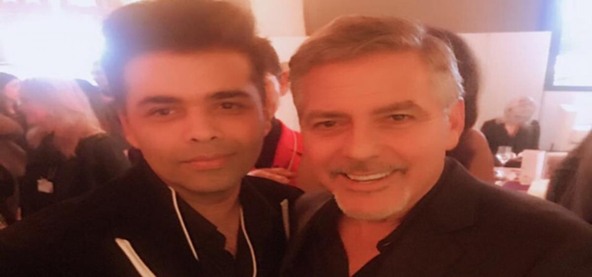 Karan Johar meets George Clooney 