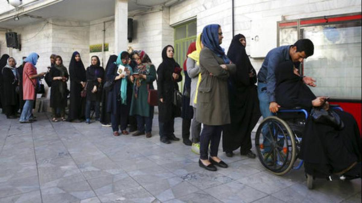 Presidential polls: Iran votes in verdict on Rouhanis economy, diplomacy