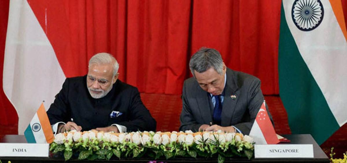 How many deals did India sign with Singapore?