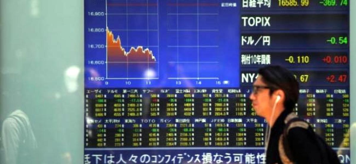 Asia shares recover losses, markets await Trump news conference