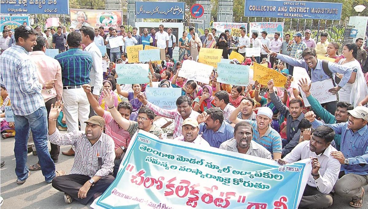 Model School teachers stage massive dharna at Collectorate