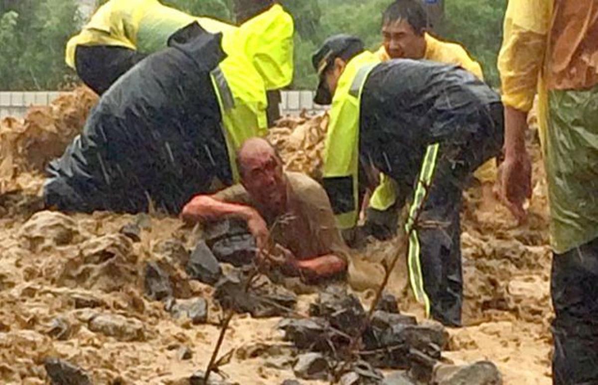 20 dead, missing as Typhoon Soudelor weakens over China