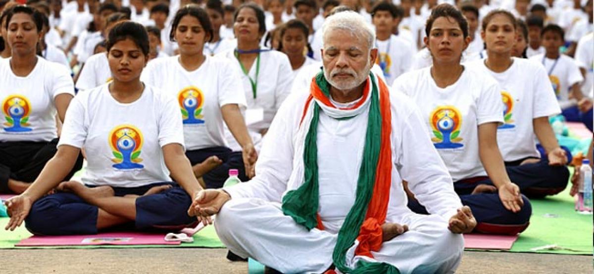 Yoga no religious activity, a global mass movement: Modi