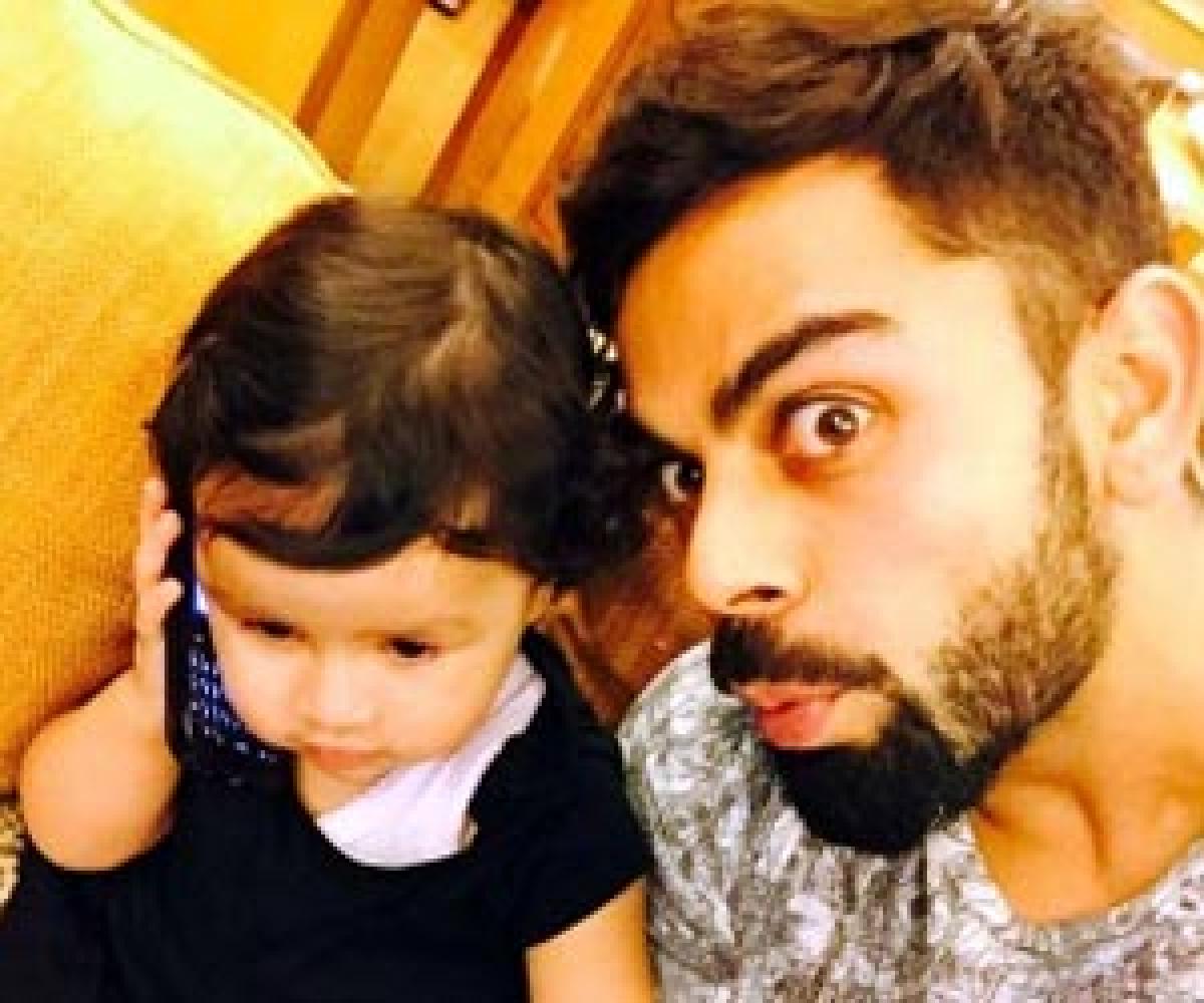 Virat Kohli spends time with Dhonis baby girl