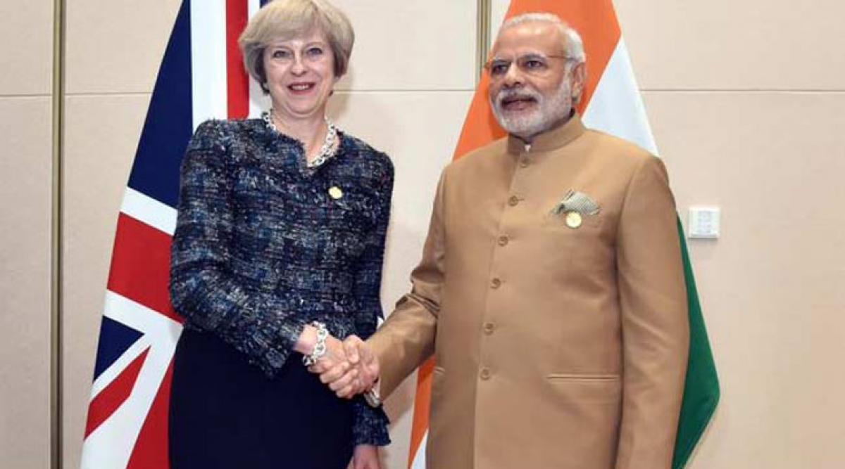 Modi asks Theresa May to relax student visa norms