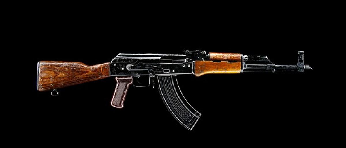 Stolen AK-47 recovered, 2 held