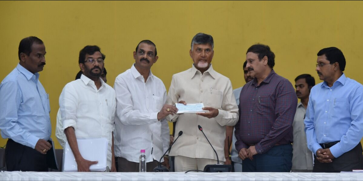 APSWC officials hand over cheque to CM