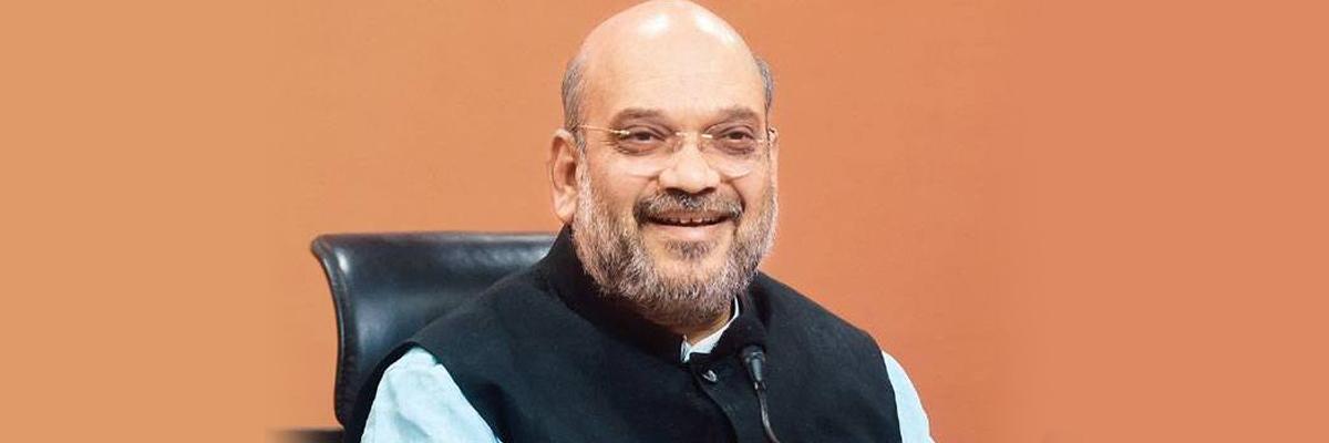 Chaiwala done better job than economist: Amit Shahs jibe at Manmohan Singh