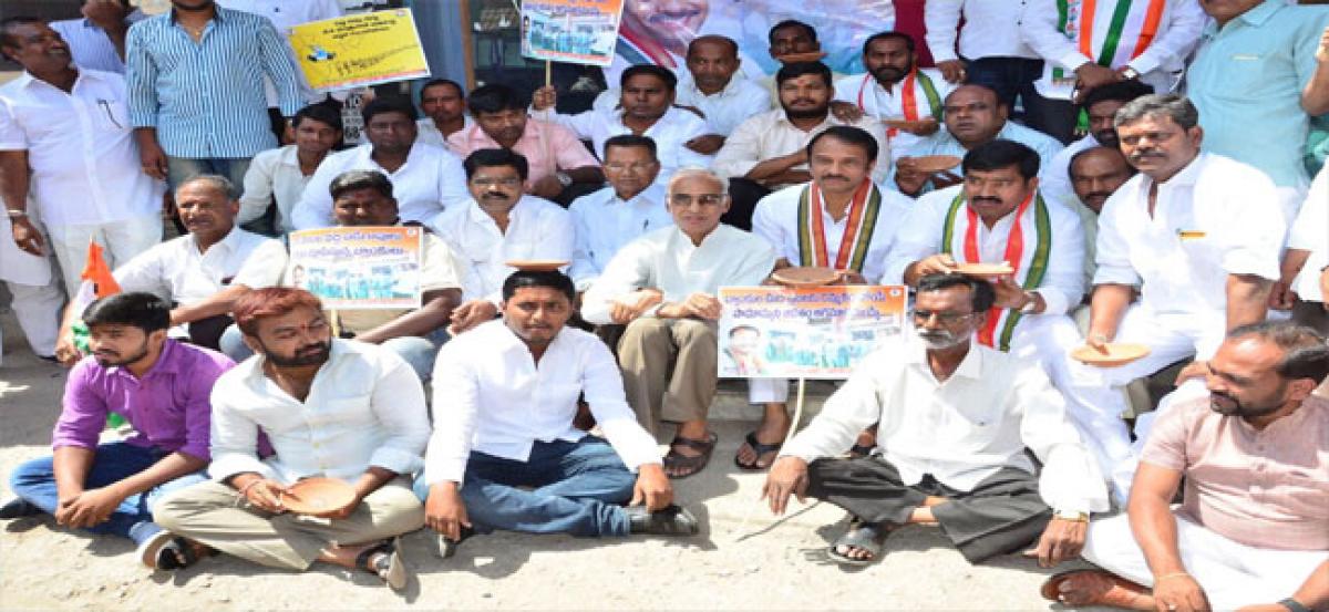 Former MLA launches novel protest by begging in front of ATM