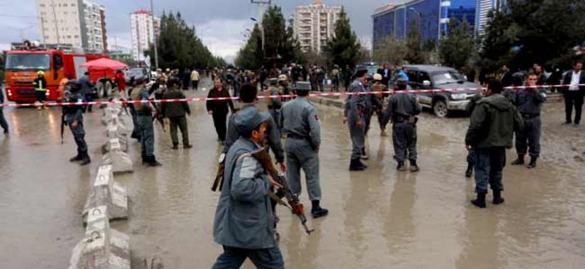 Suicide bomber kills 14 at political meeting in Afghanistan