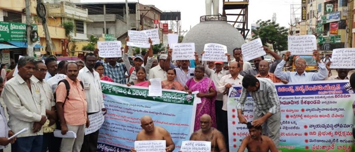 Agrigold customers, agents tonsure heads in protest in Ongole