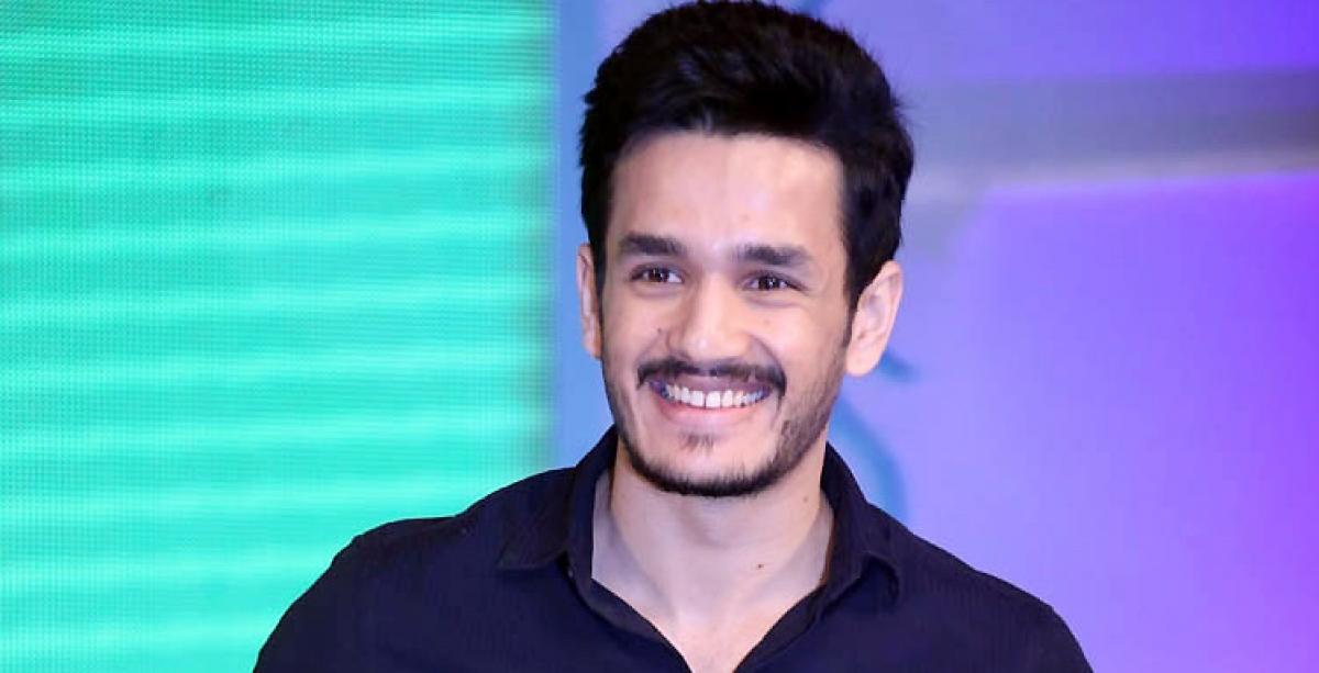 Akhil shoots with father Nag!