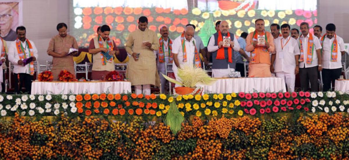 ‘Money, Modi and The Magic’ launched by BJP President Amit Shah at Shimoga, Karnataka