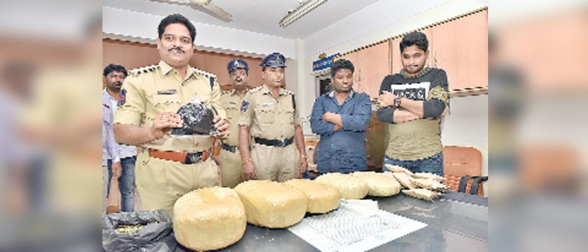 Two youngsters arrested for peddling dry, liquid ganja