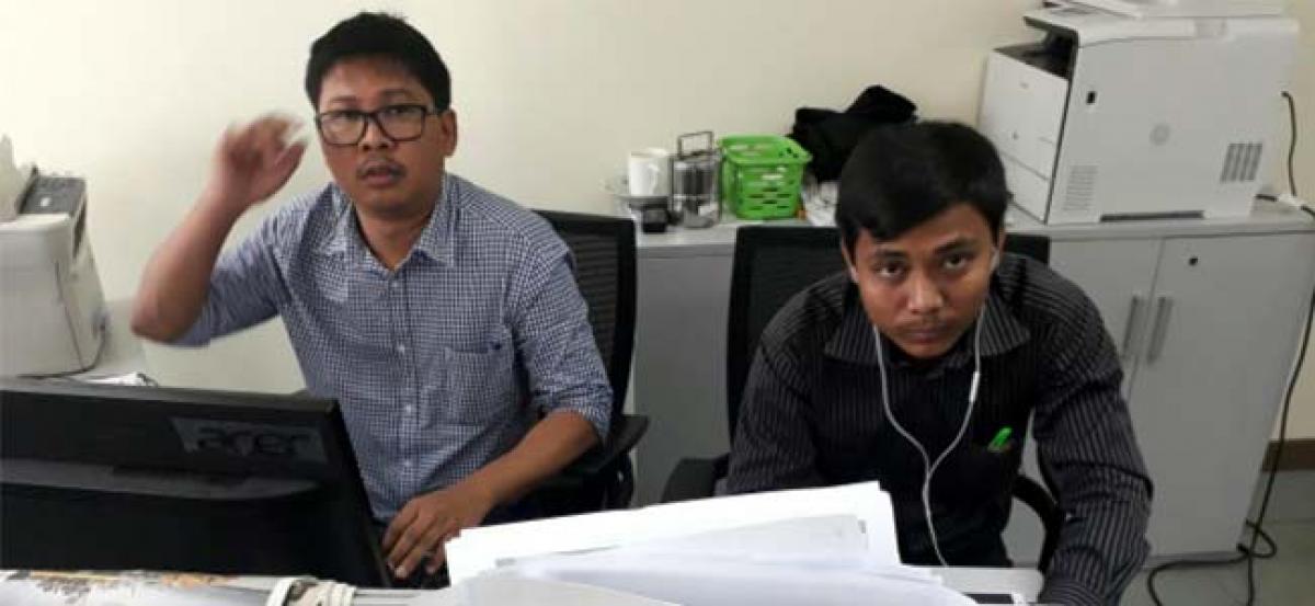 Myanmar judge jails Reuters reporters for seven years in landmark secrets case