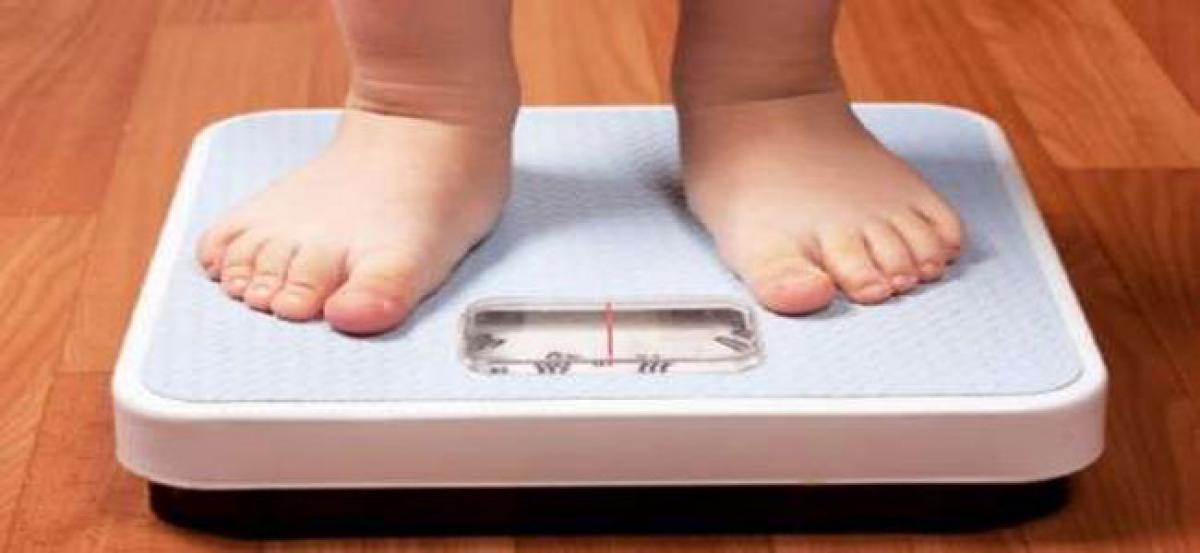 C-section, gut bacteria may up obesity risk in kids