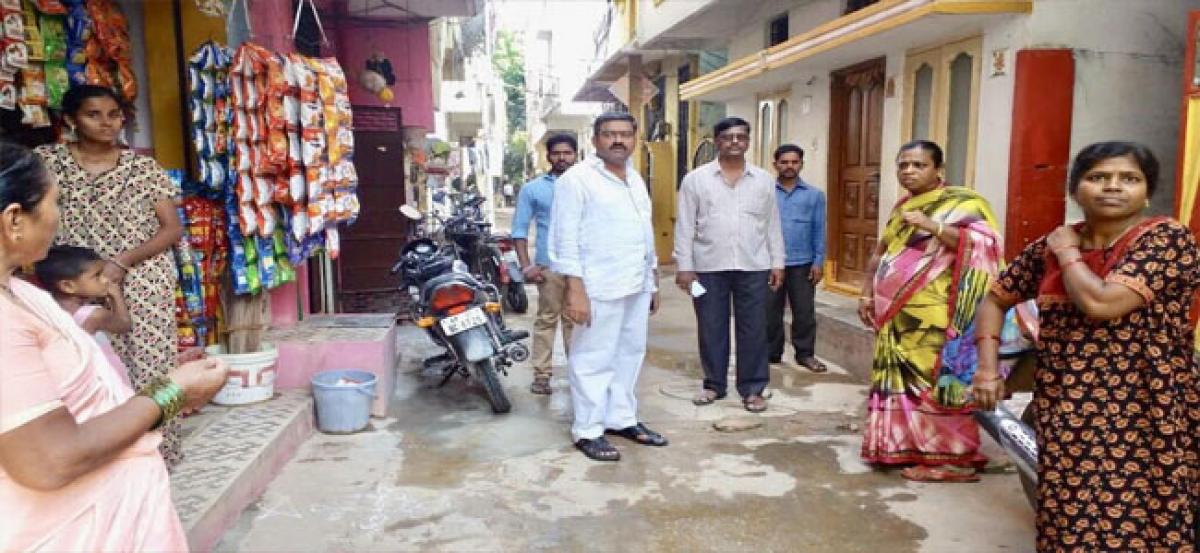 Corporator Kanduri Narendra Acharya attends to water issues