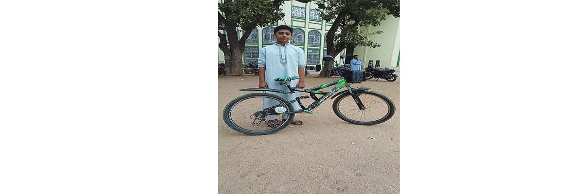 Youth turns bicycle into battery-run bike