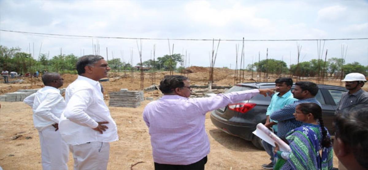 Officials asked to expedite 2BHK works