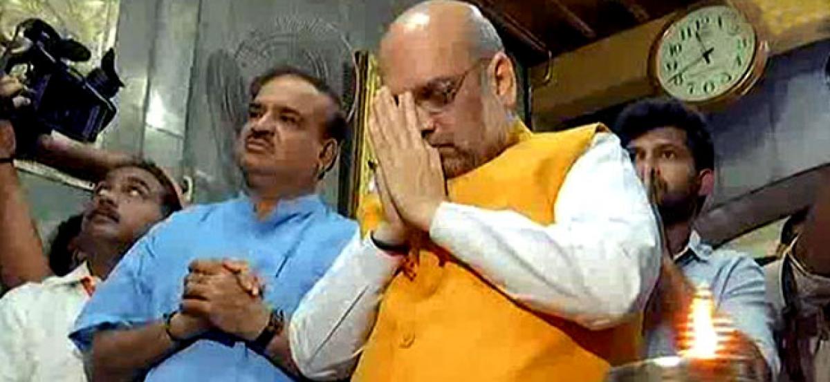 Ktaka polls: Amit Shah visits temple in Siddaramaiahs home turf