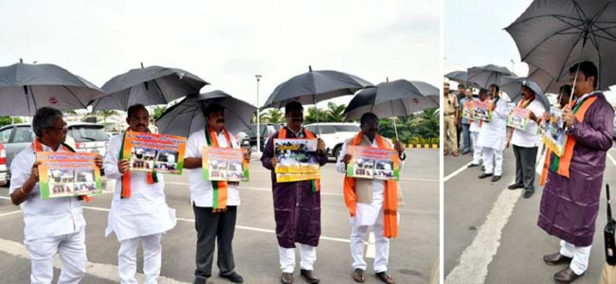 BJP legislators come to Assembly with umbrellas