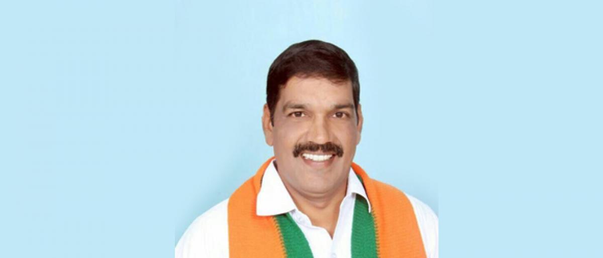 Srinivas BJP Kakinada city unit president