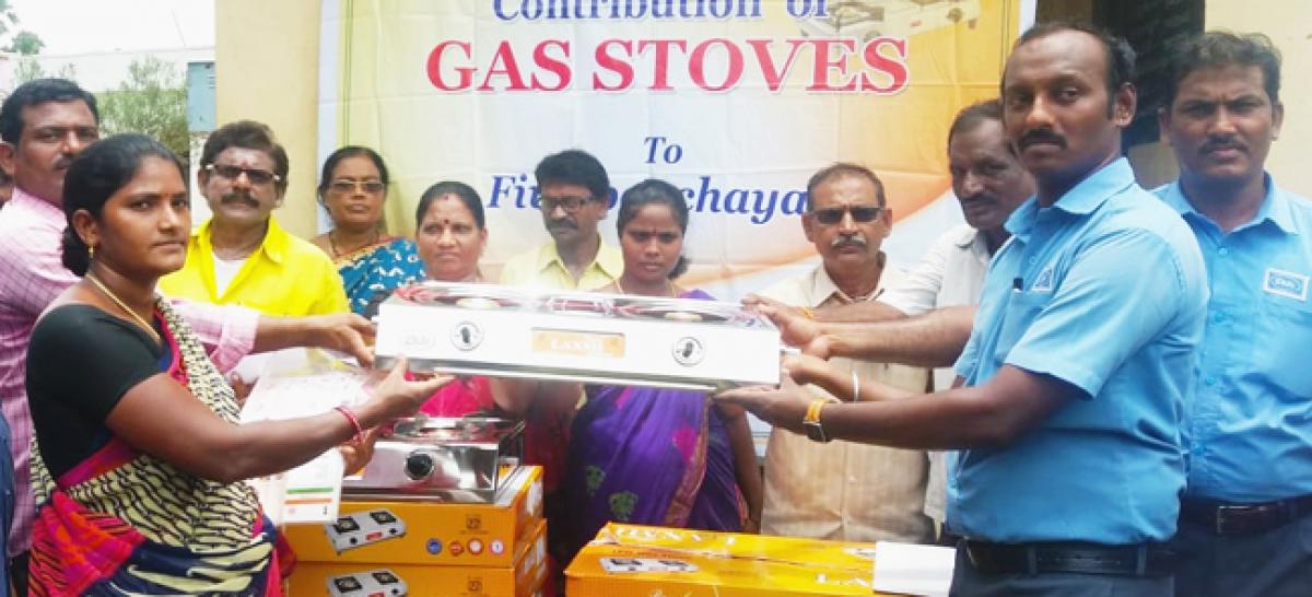 Divis Labs distributes gas stoves under Corporate Social Responsibility