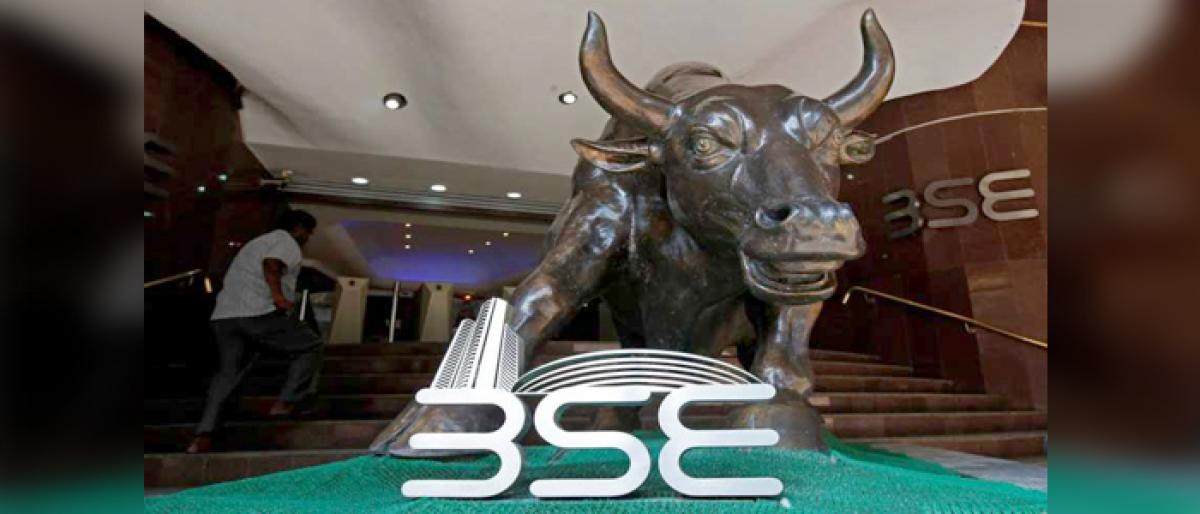 Sensex rises over 100 points on firm rupee, falling crude prices