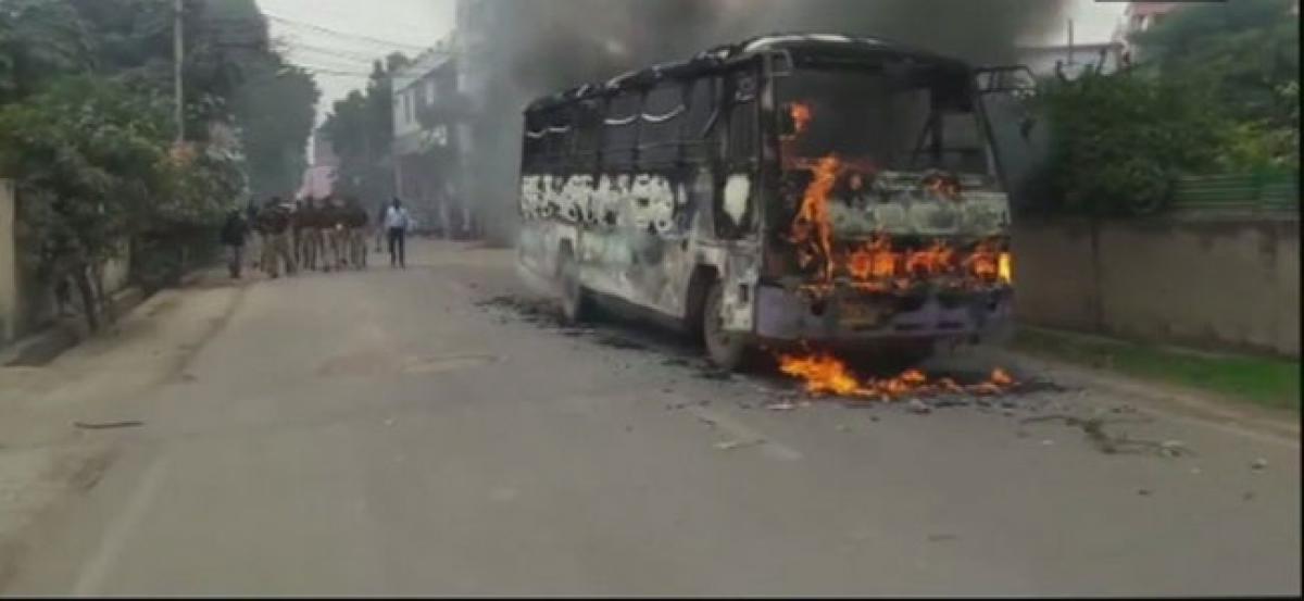 Protest erupts in Allahabad over law student death, bus torched