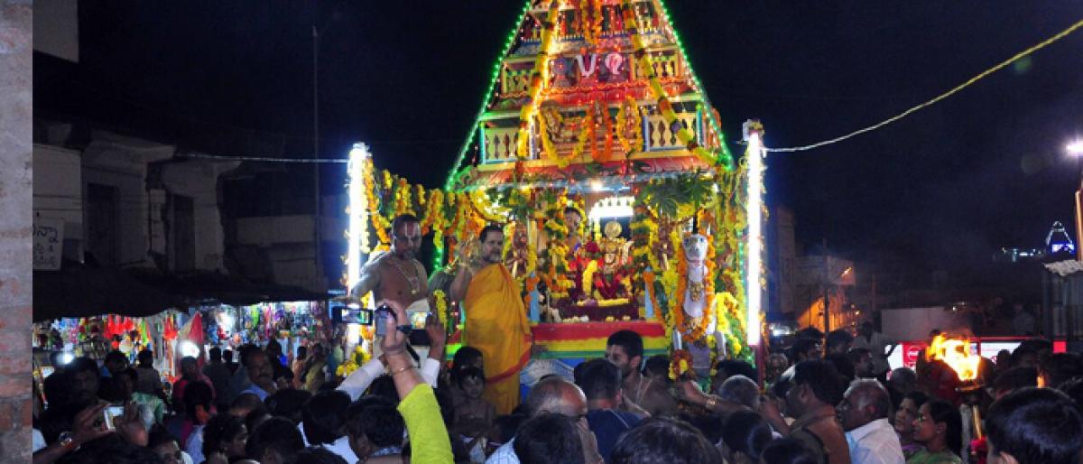 Procession in the temple town brings festive look
