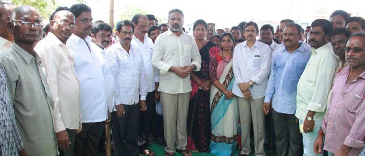 MLA V Venkateswara Rao lays stone for approach road in Kakinada