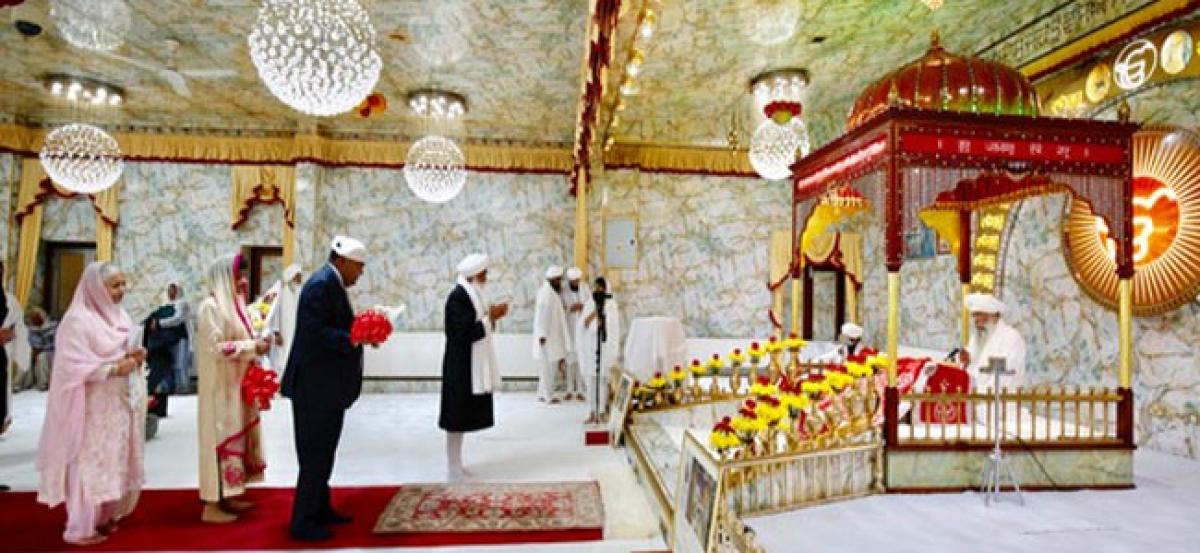 Indian envoy pays respects to Guru Granth Sahib in Birmingham