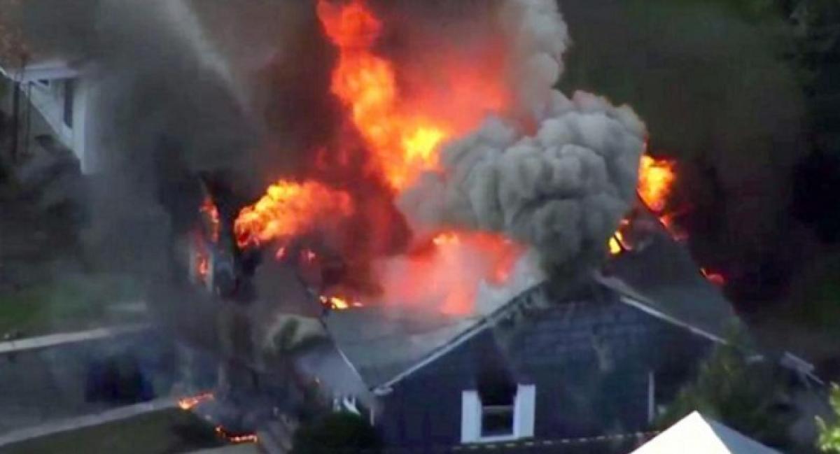 At least one dead as dozens of gas blasts rock Boston suburbs in US
