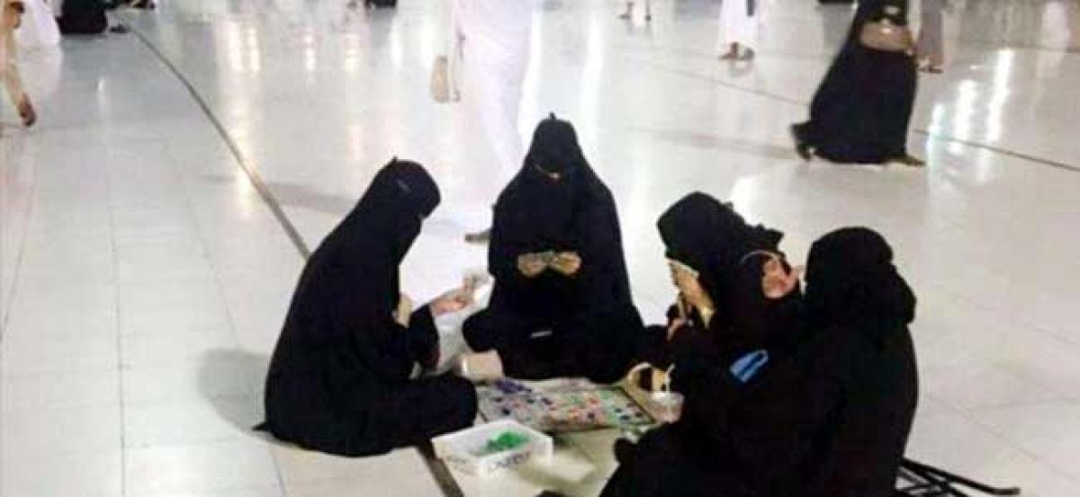 Burqa-clad women playing board game at Mecca mosque spark controversy