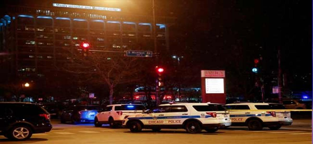 Gunman at Chicago hospital kills three before dying in shootout