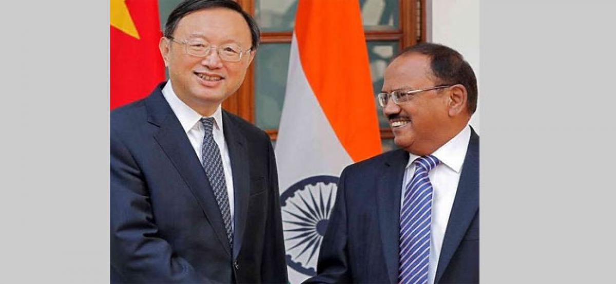 India, China press for peace, tranquillity in border areas