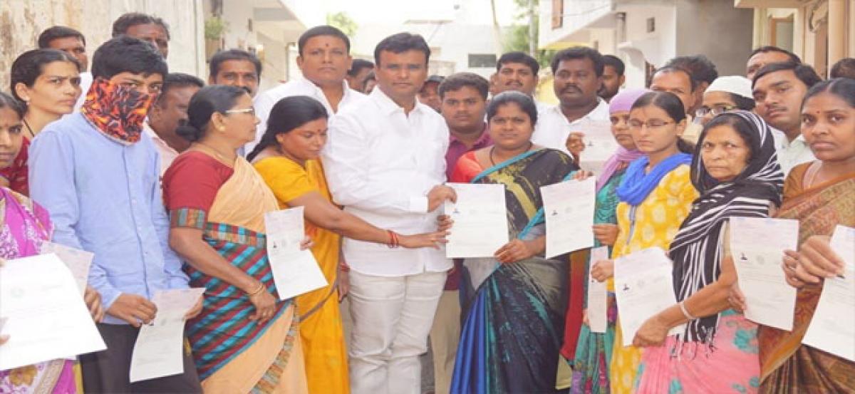MLA distributes CMRF cheques to 19 patients