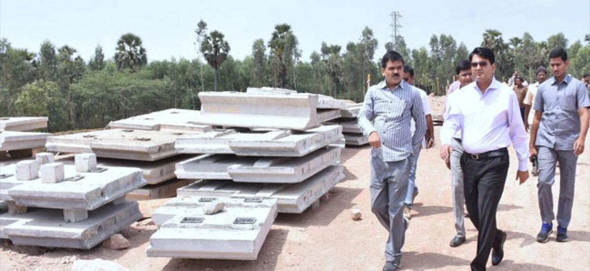 Collector inspects highway works