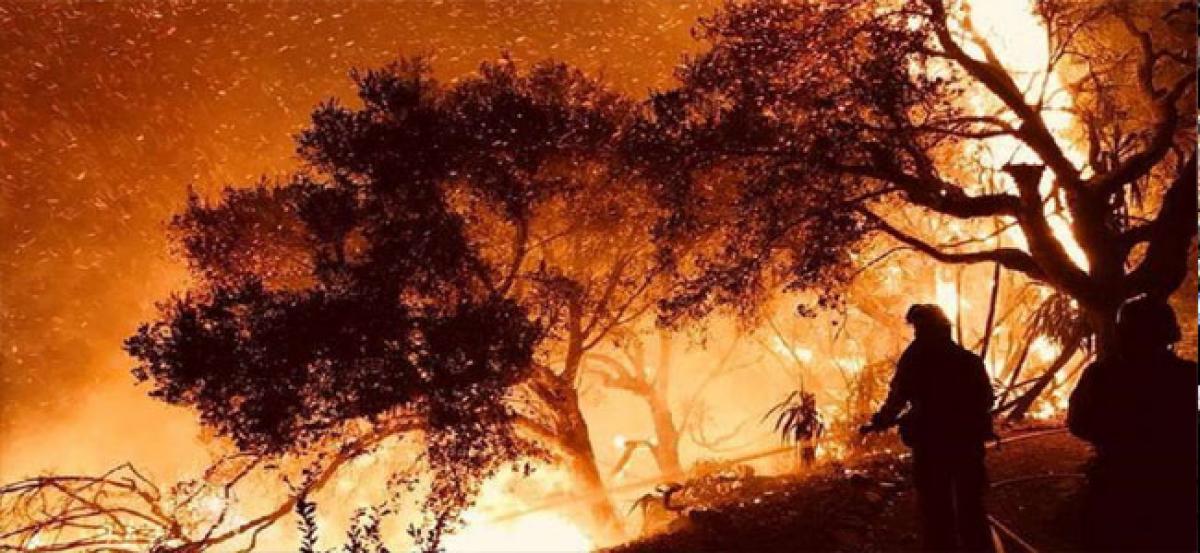 California Wildfire: Raging blaze spreads, killing six and destroying more homes