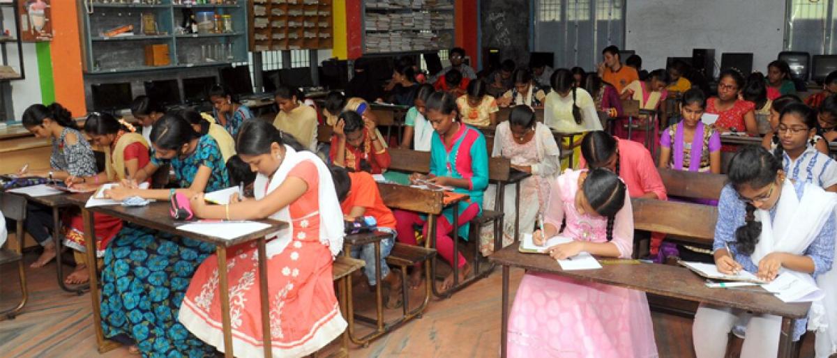 100 students take part in Calligraphy Exam in Vijayawada