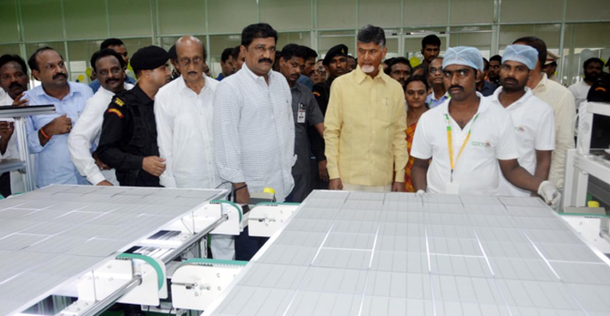 Chandrababu Naidu distributes house pattas