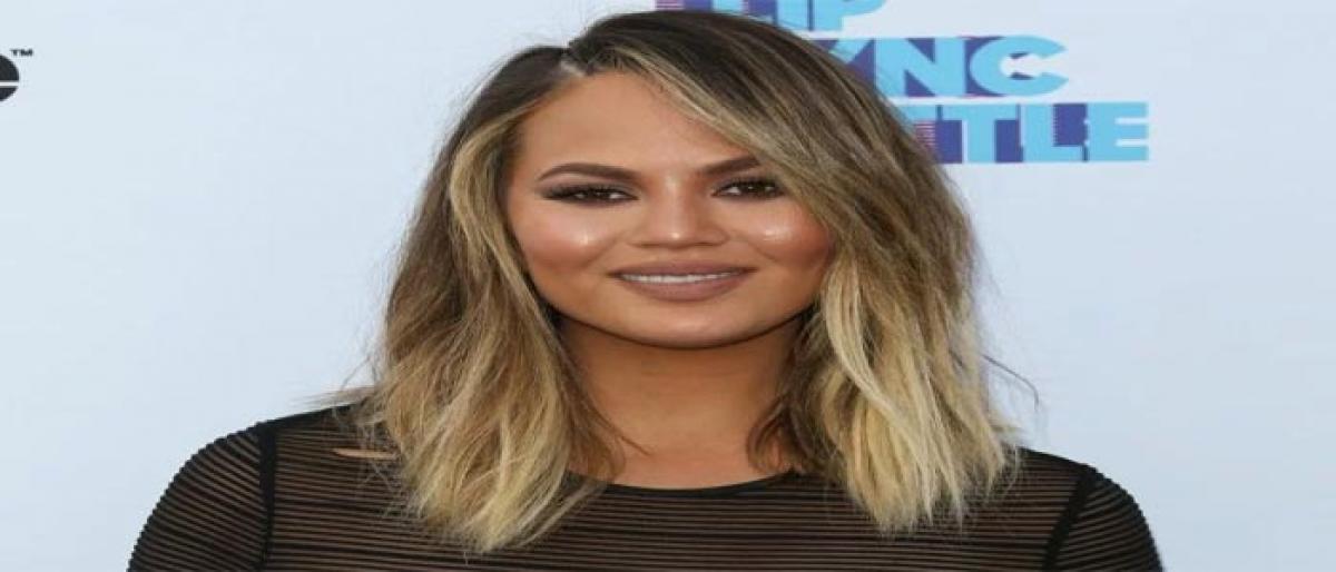 Chrissy Teigen has a crush on Zac Efron