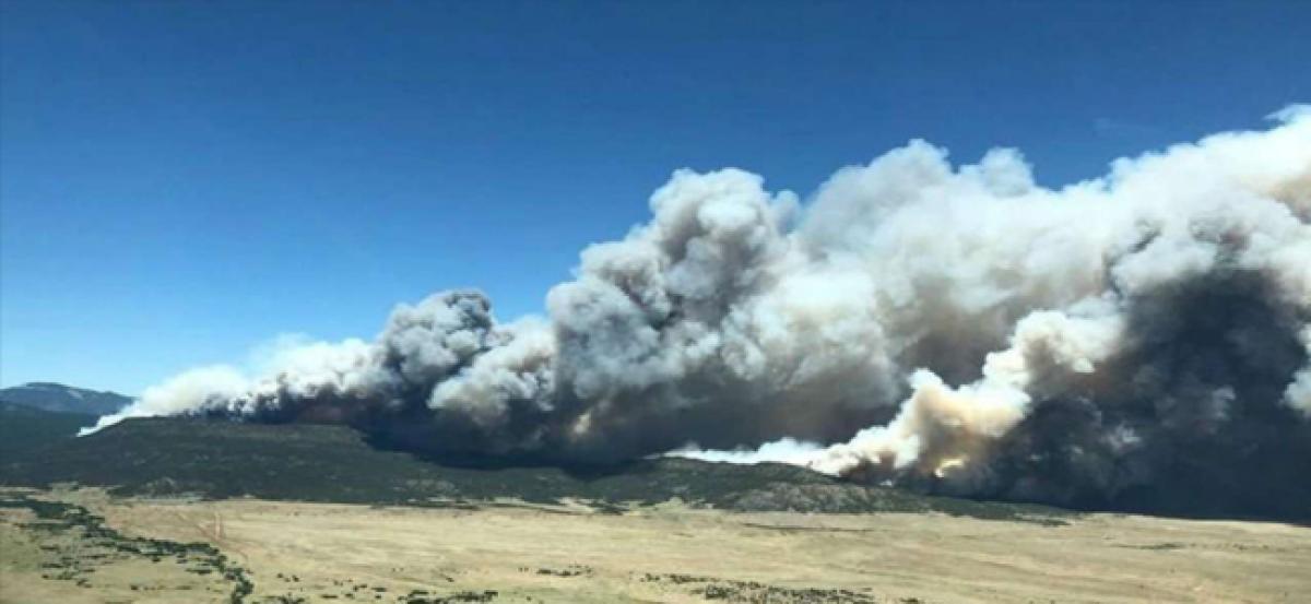 Crews gain ground on New Mexico wildfire, Colorado blaze continues to rage