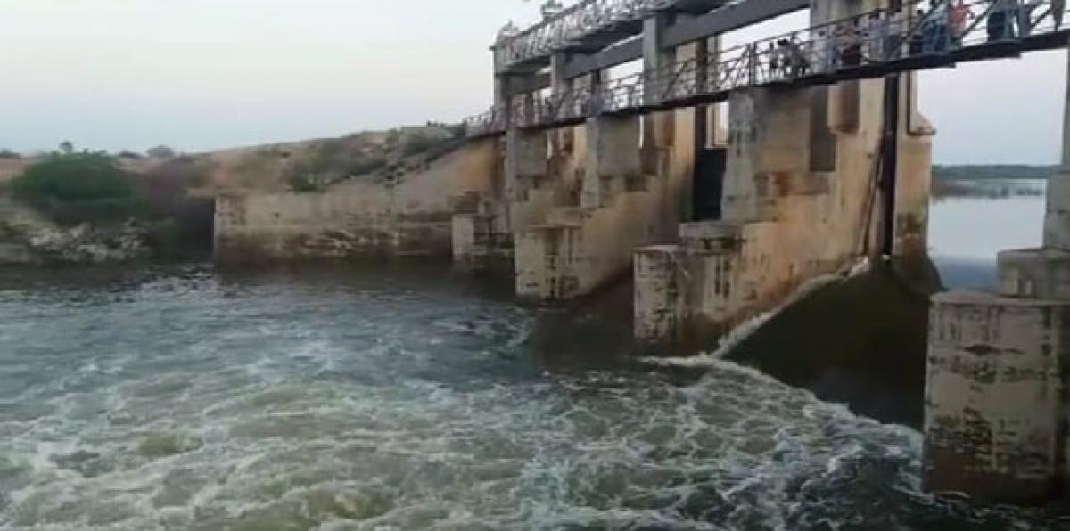 Crest gate of Sagileru reservoir washed away