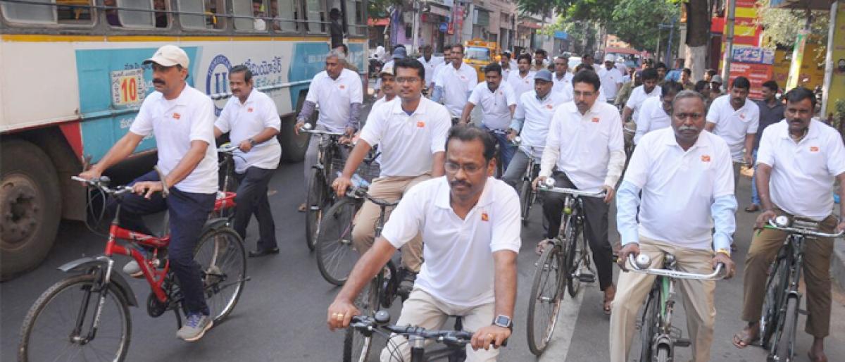 Cycle rally by postal staff organised in Vijayawada
